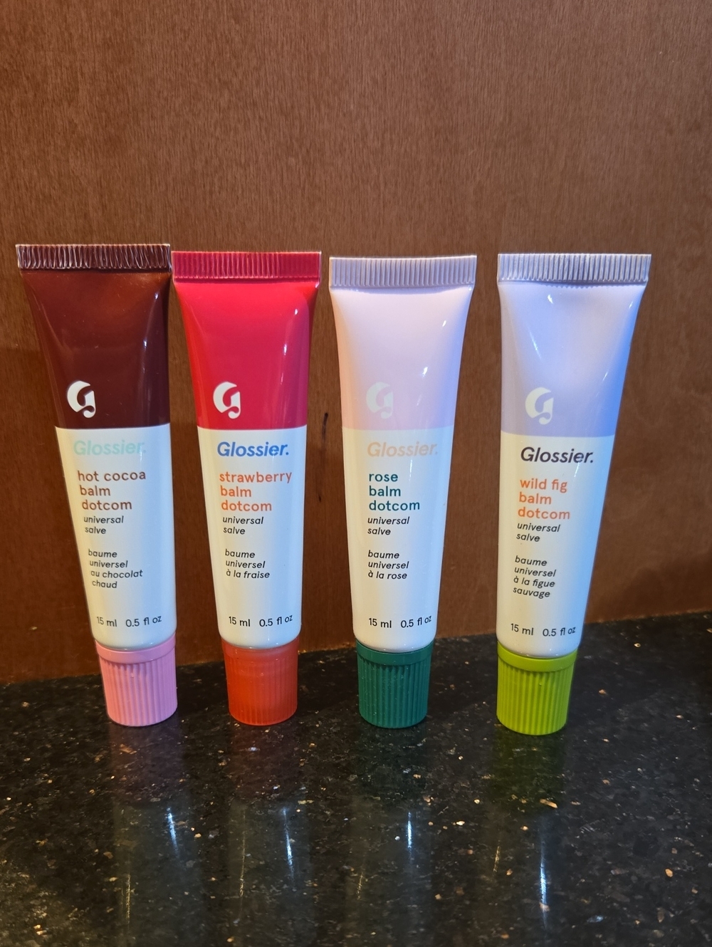 Glossier Lip Balm Set - Brown, Pink, White, Light Blue with Colored Caps